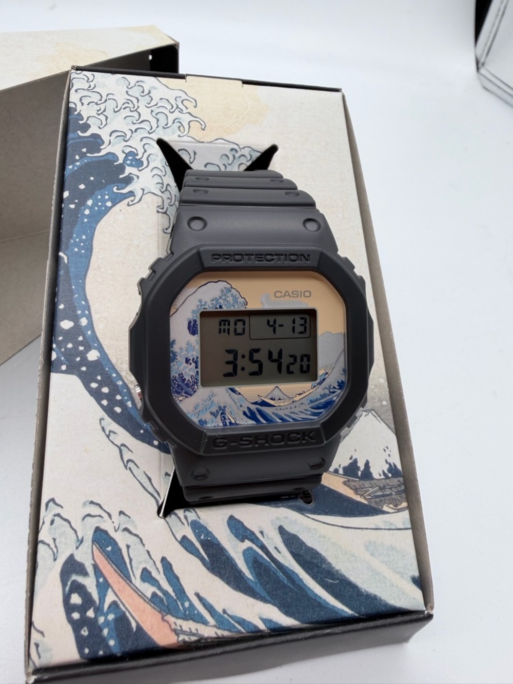 Casio G-Shock Matte Black Watch with Blue and Cream Wave Dial